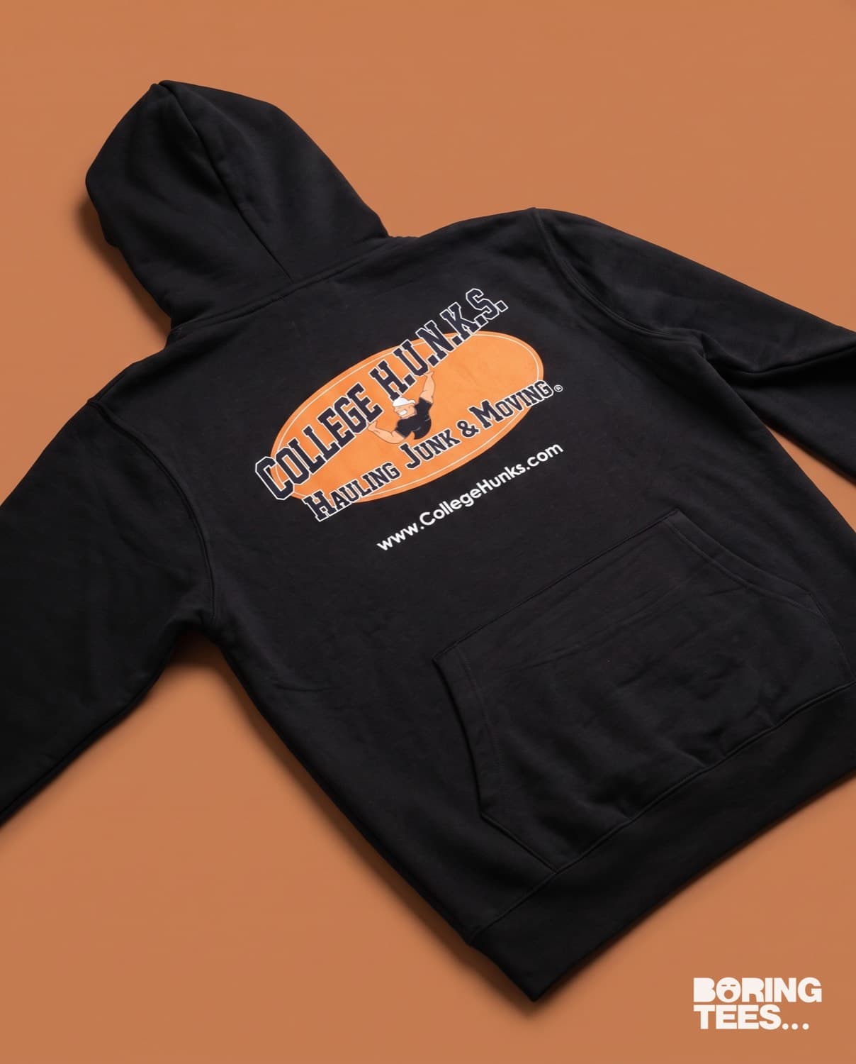 Black hoodie with the full-colour College Hunks Hauling Junk and Moving logo printed across the back