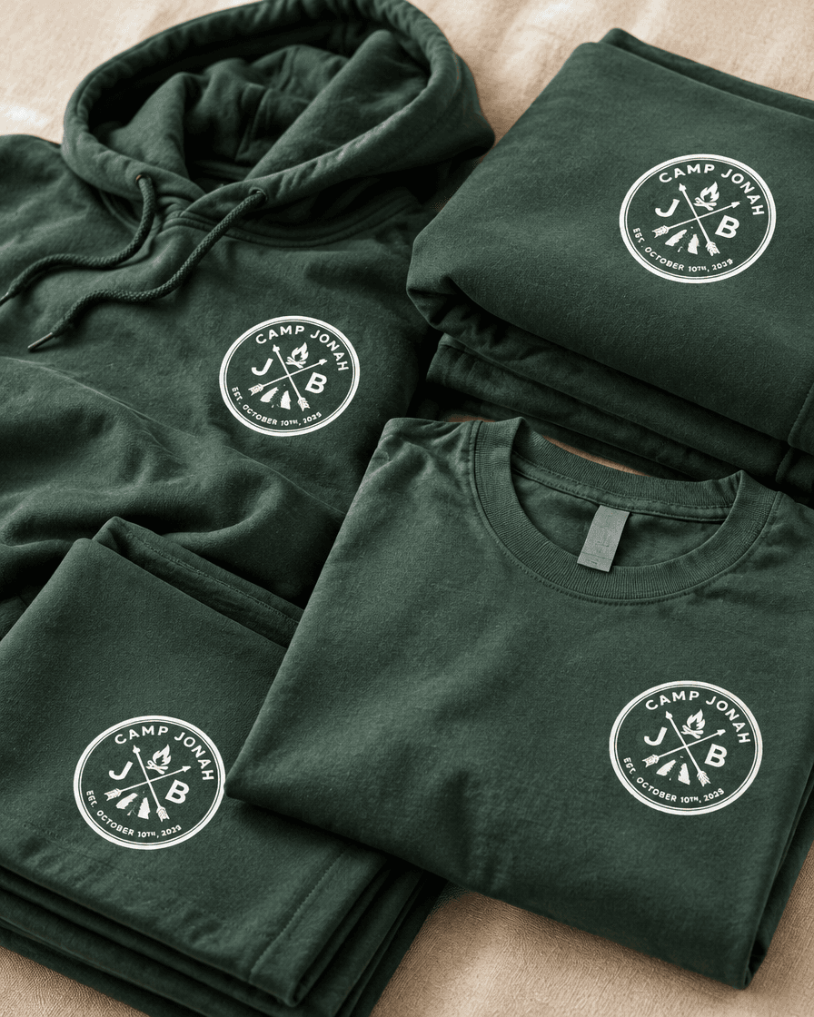 Deep green custom event hoodies, T-shirts, and blankets with white printed designs
