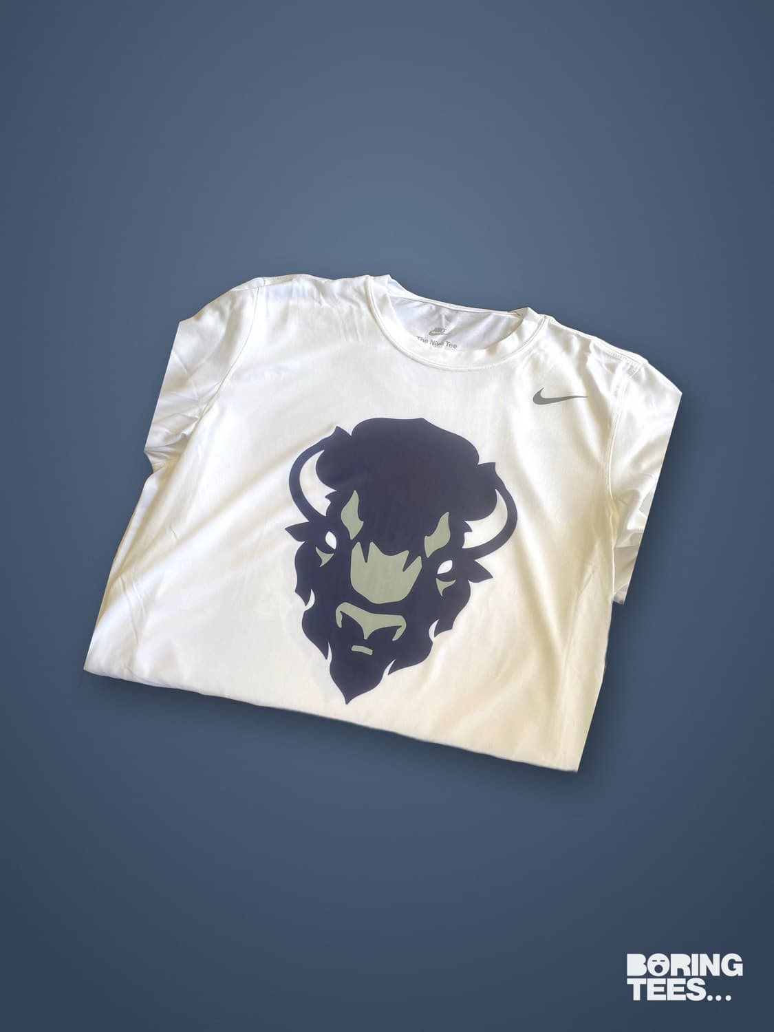 Cream Nike tee with a navy and sage Howard Bison mark printed centre chest