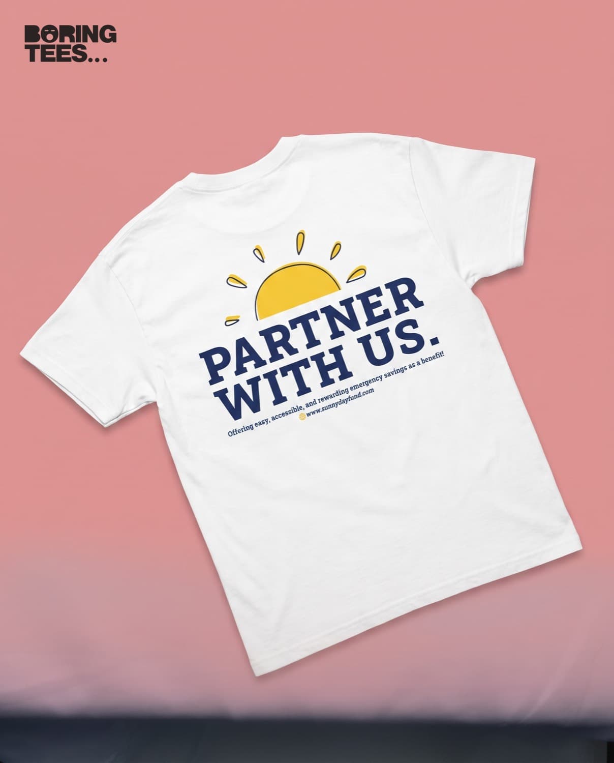 White tee with a large navy and gold back print reading PARTNER WITH US under a sun graphic